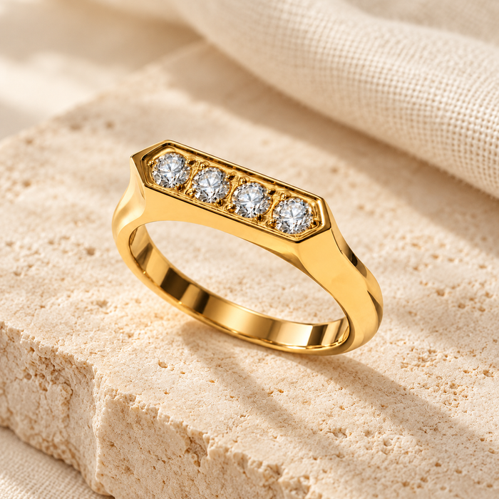 LAYERGAL four stone gold ring on ivory limestone